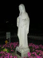 Statue of Queen of Peace, St. James Church at the night